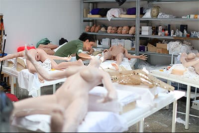 manufacture dolls